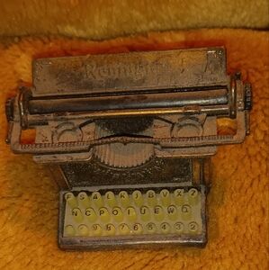 Gold Vintage Typewriter Close-Up Artistic Mechanical Design